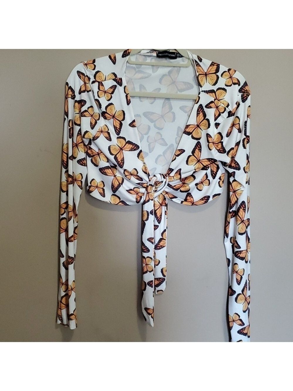 Pretty little thing shrug size 10